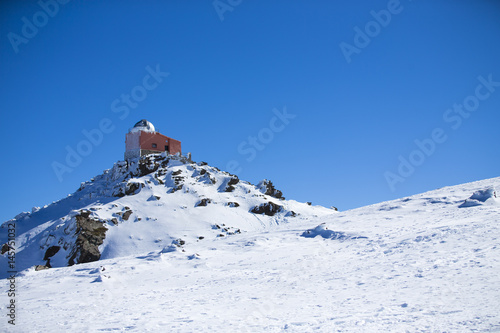 Observatory in a mountain snow.