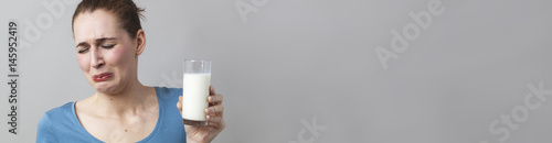 nauseous woman disgusted at having to diet with white milk