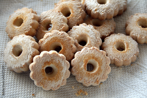 Canestrelli, italian biscuits with a flower shape and sugar