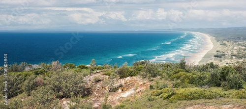 View of the pristine beach at Moreton Island during the day.