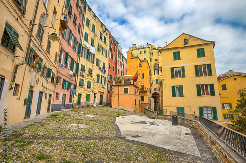 GENOA (GENOVA) ITALY. APRIL 14, 2017 - View of a part of old city called "Campo Pisano", a square with colorful houses in Genoa, Italy