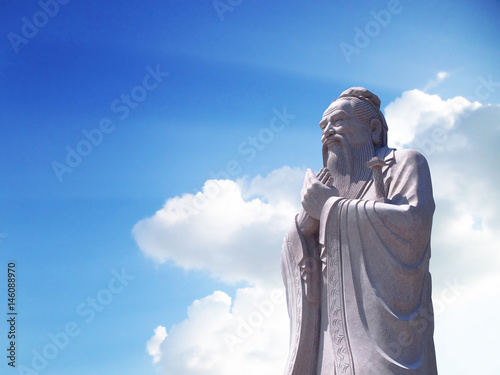 Confucius statue with sky background