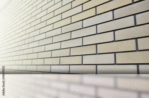 Detailed picture of a quality and ideally smooth brickwork in perspective