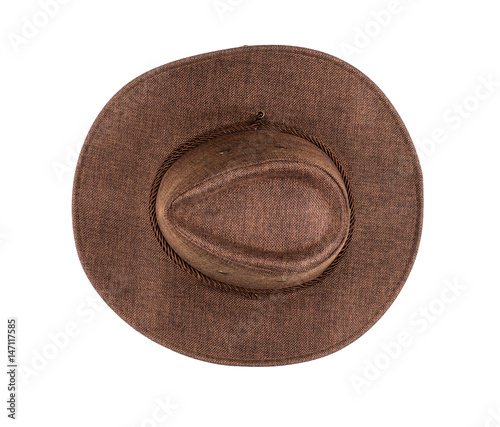 Brown cowboy hat on white isolated background, close-up, top view