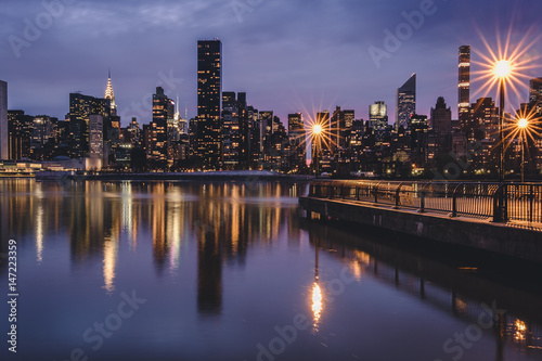 Manhattan skyline seen from the East River side in Queens, New York City