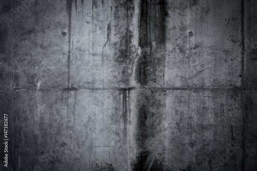 Simple dark concrete wall background with texture