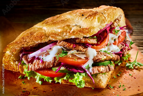 Turkish doner with roasted meat and salad