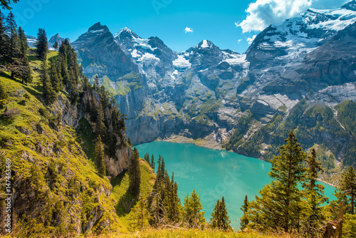 Beautiful magical landscape with the lake Oeschinensee in the Swiss Alps, near Adelboden, Switzerland, Europe