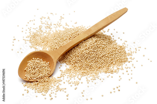 Amaranth grains with wooden spoon
