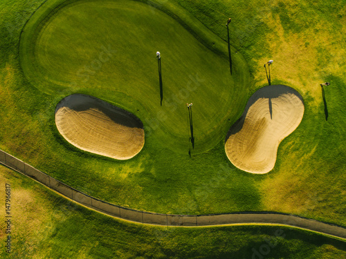 Aerial view of beautiful golf course with players