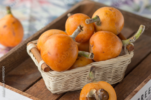 loquats on kitchen counter background.