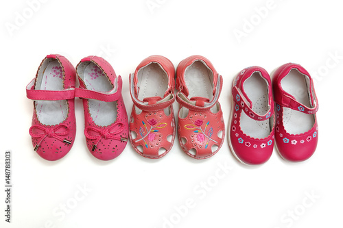 Beautiful baby shoes on a white background