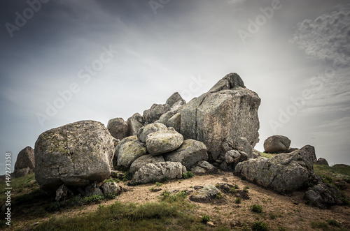 Rocks formations in Dobrogea, Tulcea county, Romania. Naturally formed piles of large rocks in Macin Mountain the olders alps in Europe