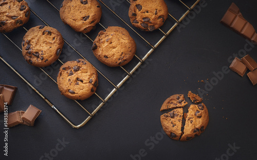 Chocolate chip cookies over dark background