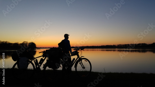Mazury, Poland. Sunset lake landscape with the bicycles