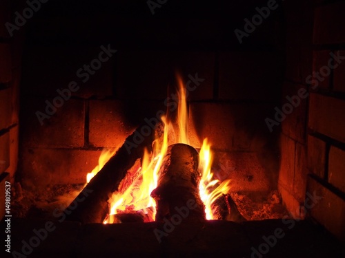 Fire in fireplace at night