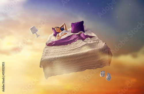 girl is flying in her bed