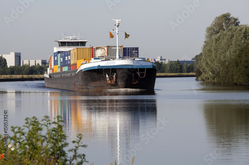 Riverboat, barge Netherlands. Inland shipping. Container ship. Meppelerdiep. Meppel. Zwartsluis. Freightship.