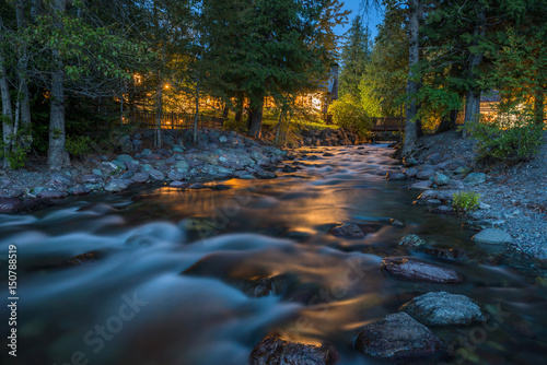 Snyder Creek at Night - A spring night view of Snyder Creek at Lake McDonald Lodge. Glacier National Park, Montana, USA.