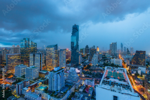 Aerial view of Bangkok modern office buildings, condominium in Bangkok city downtown with twilight sky , Bangkok , Thailand