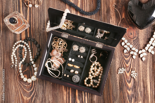 Jewelry accessories in box and table, top view