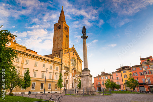 Piacenza, medieval town, Italy. Piazza Duomo in the city center with the cathedral of Santa Maria Assunta and Santa Giustina, warm light at sunset. Emilia Romagna