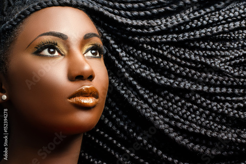 African female beauty with braided hair.