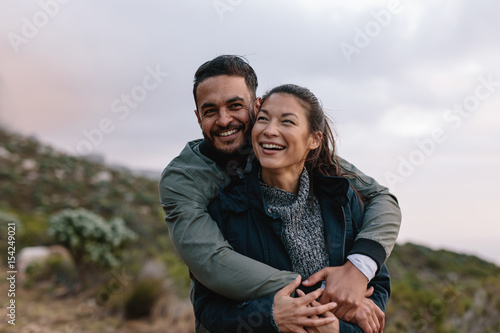 Romantic young couple on country trail