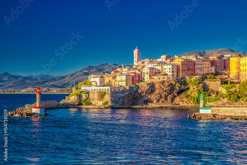 View to Bastia old city center, lighthouse and harbour, Corsica, France, Europe.