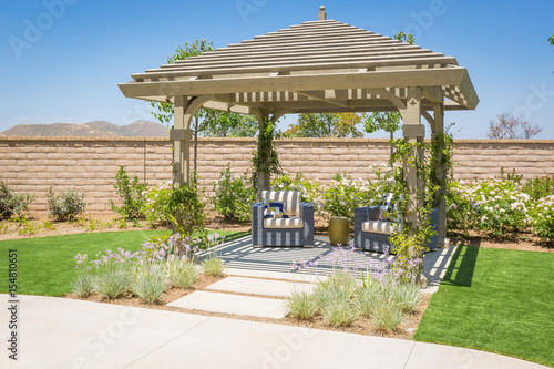 Beautiful Yard Pergola Patio Cover with Chairs.