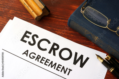 Document with title escrow agreement.