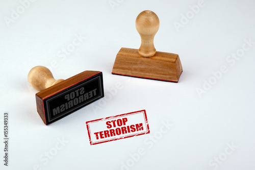 Stop terrorism rubber stamper with wooden handle Isolated on white background 