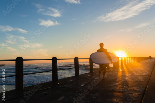 Surfing Surfer Silhouetted Walking Pier Sunrise Ocean