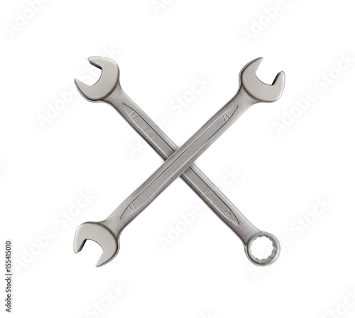 X made of mechanic silver metal tool wrench for repair isolated on white