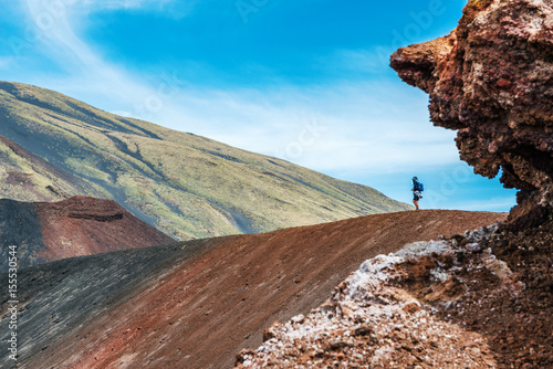 Tourist stood on Mount Etna volcano