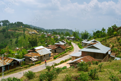 Palaung Village. Rural mountain village of Palaung Tribe near Kyaukme, Shan State, Myanmar. It is now tea season and green tea is drying on bamboo mats all around the village.