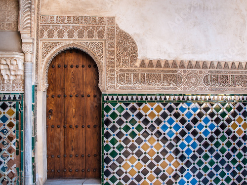 Detail of a door and ornament of Alhambra, Granada, Spain