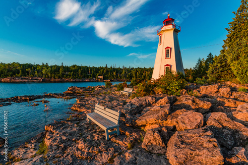 Peaceful Morning Light at Big Tub Lighthouse in Tobermory Ontario Canada attractionbaybeachbeautifulbenchbigbig tubbrucecalmcanadacanadianchilldestinationgeorgiangeorgian bayharborhistorichuronlakela