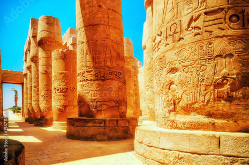 Travel in Egypt. Great Hypostyle Hall and clouds at the Temples of Karnak (ancient Thebes). Luxor, Egypt