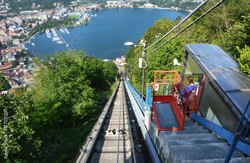 Amazing view of funicular railway stop on Lake Como climbing to Brunate with tourists wating, Como, Italy 