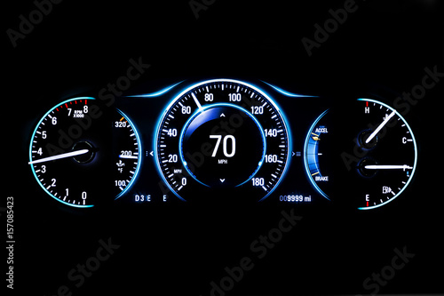 Modern light car mileage on black background 70 mph