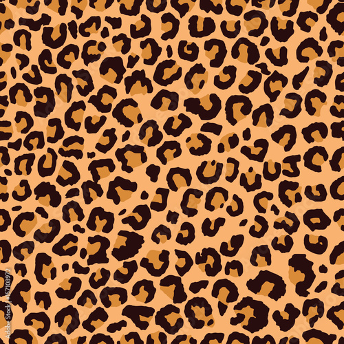 Seamless orange and black fashion leopard spots pattern vector