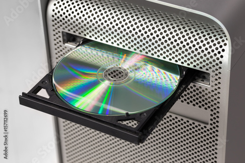 DVD CD ROM on a computer opened to show disc