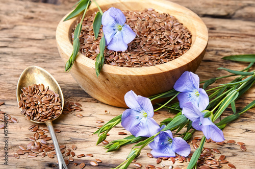 Linseed on wooden background