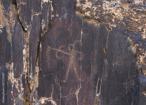ancient rock drawings, human with bow and arrow, hunting