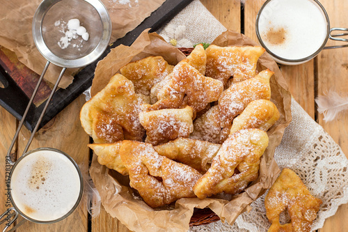 Sweet crisp pastry Angel wings with powdered sugar