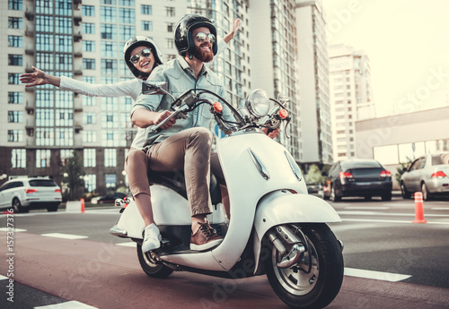 Couple on scooter