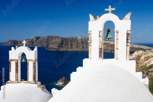 Greek church bell towers in Oia, Santorini, Greece