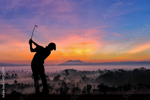 silhouette of golfers hit sweeping and keep golf course in the summer for relax time
