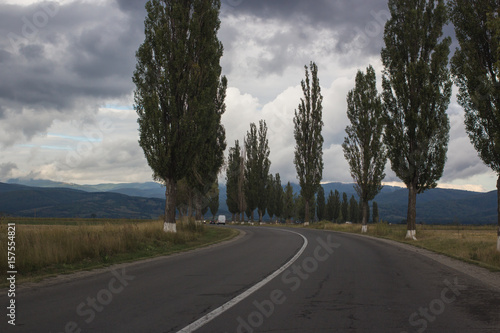 beautiful landscape. countryside road to mountains